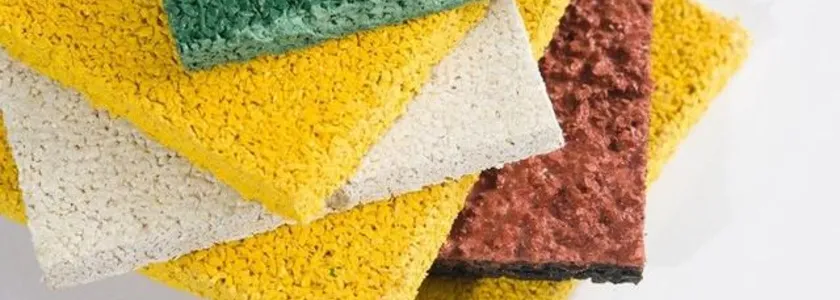 Rubber granule samples in four colors